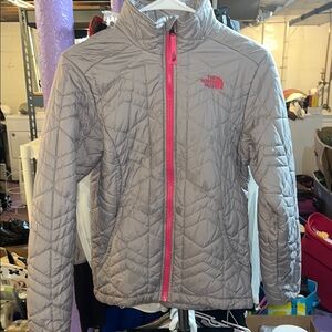 The North Face Gray and Pink Puffer Jacket with Quilted Design